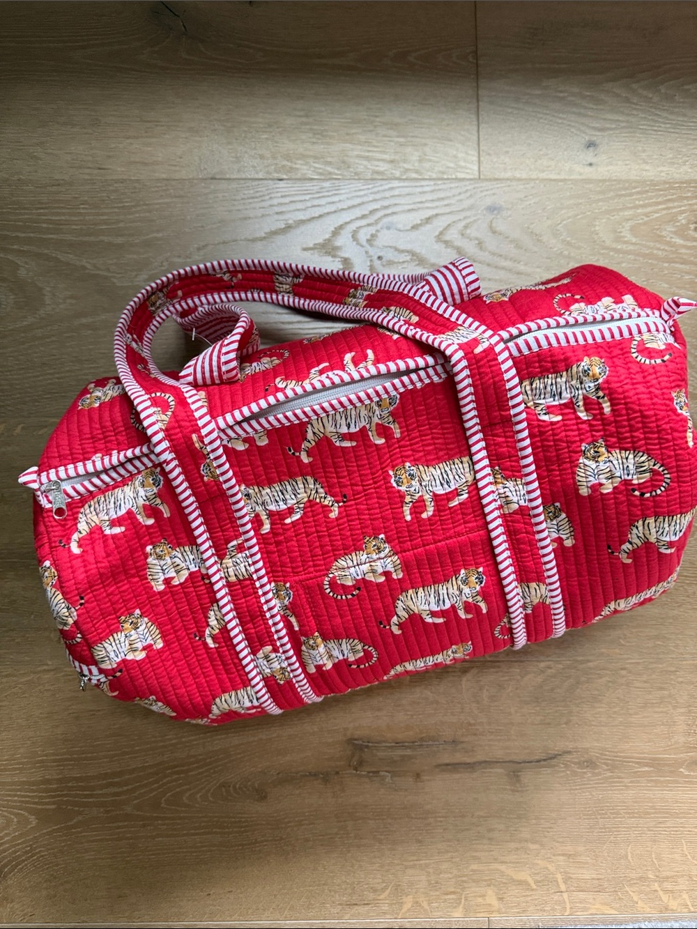 Red Quilted Tiger-Print Travel Duffel Bag with Striped Handles